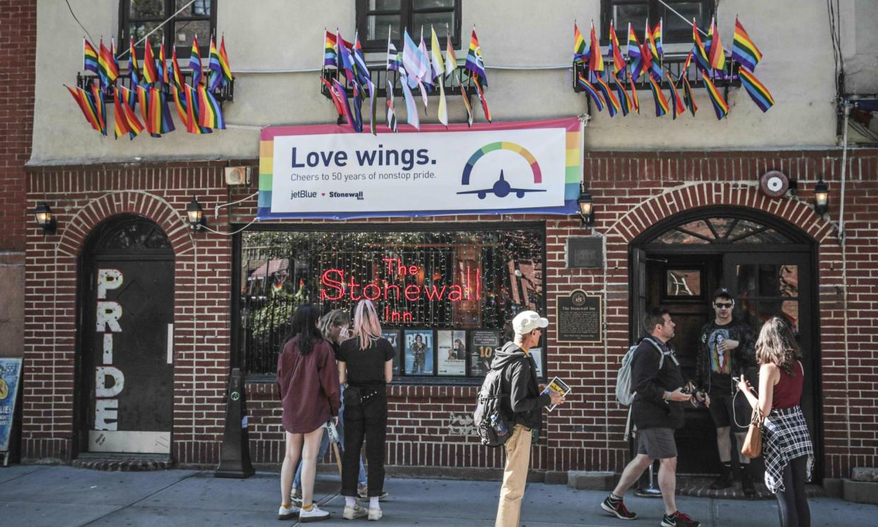 <span>Pride flags and colors on the Stonewall Inn bar, in New York City on 3 June 2019.</span><span>Photograph: Bebeto Matthews/AP</span>
