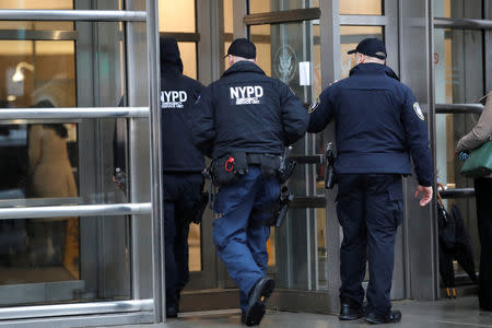 Police enter the Brooklyn Federal Courthouse ahead of start of the trial of Joaquin Guzman, the Mexican drug lord known as "El Chapo," in New York City, New York, U.S., November 13, 2018. REUTERS/Mike Segar