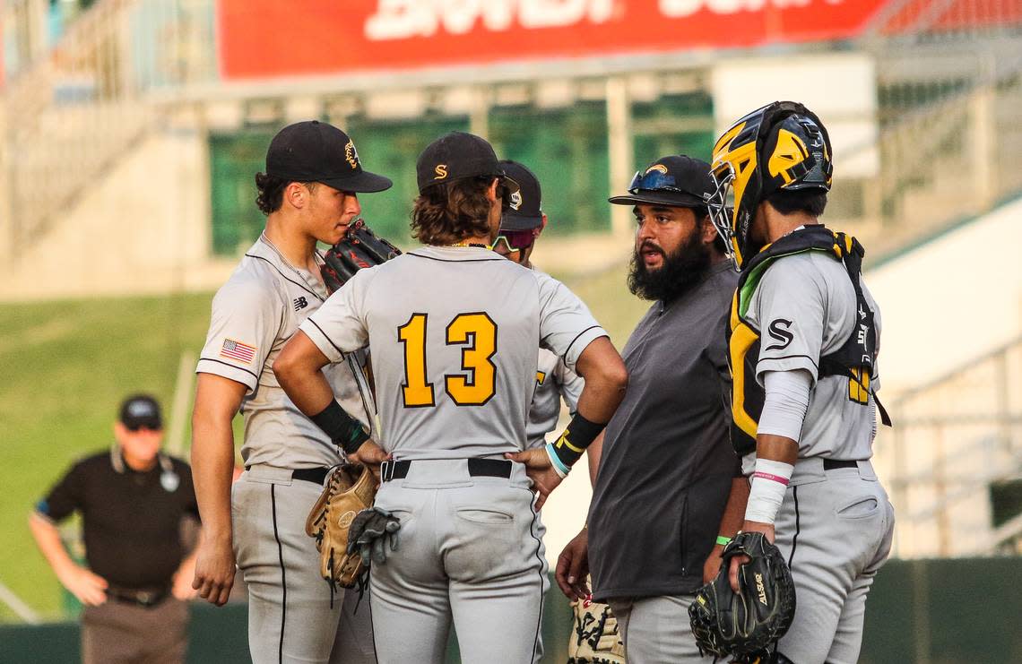 Miami Sunset coach Julio Mendoza meets with his players at the mound during Friday’s Class 4A state semifinal against Citra North Marion at Hammond Stadium in Fort Myers. The Knights lost 5-4. Jarrett Guthrie/Jarrett Guthrie/813 Preps