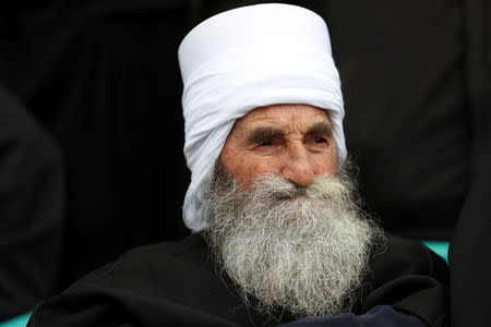 A Druze man takes part in a rally over U.S. President Donald Trump's support for Israeli sovereignty over the Golan Heights, in Majdal Shams near the ceasefire line between Israel and Syria in the Israeli occupied Golan Heights March 23, 2019 REUTERS/Ammar Awad