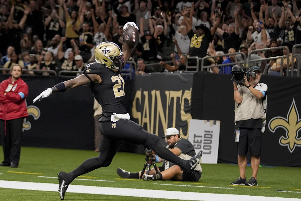 New Orleans Saints running back Jamaal Williams (21) runs into the end zone for a touchdown against the Carolina Panthers during the second half of an NFL football game Sunday, Sept. 8, 2024, in New Orleans. (AP Photo/Gerald Herbert)