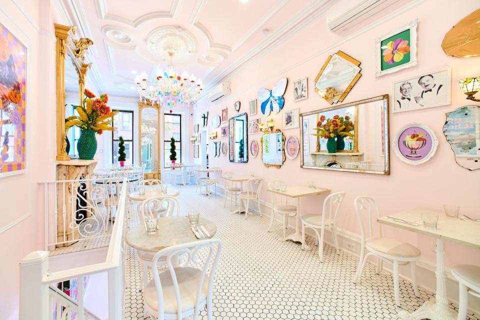 Inside Serendipity 3 restaurant it's empty with colorful walls and decor.