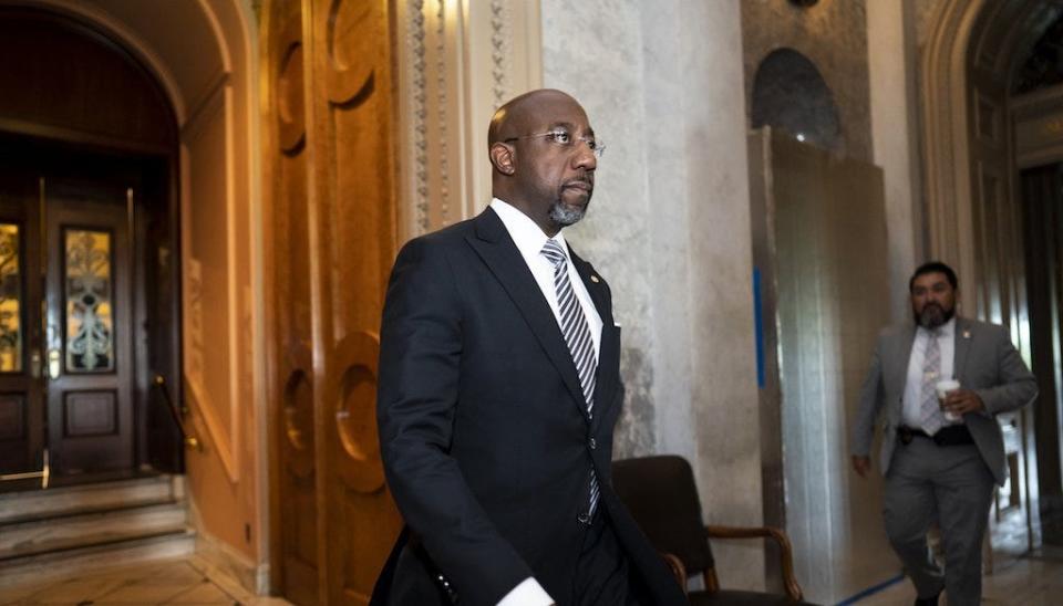 Sen. Raphael Warnock, D-Ga., leaving the Senate chamber on May 11, 2022.