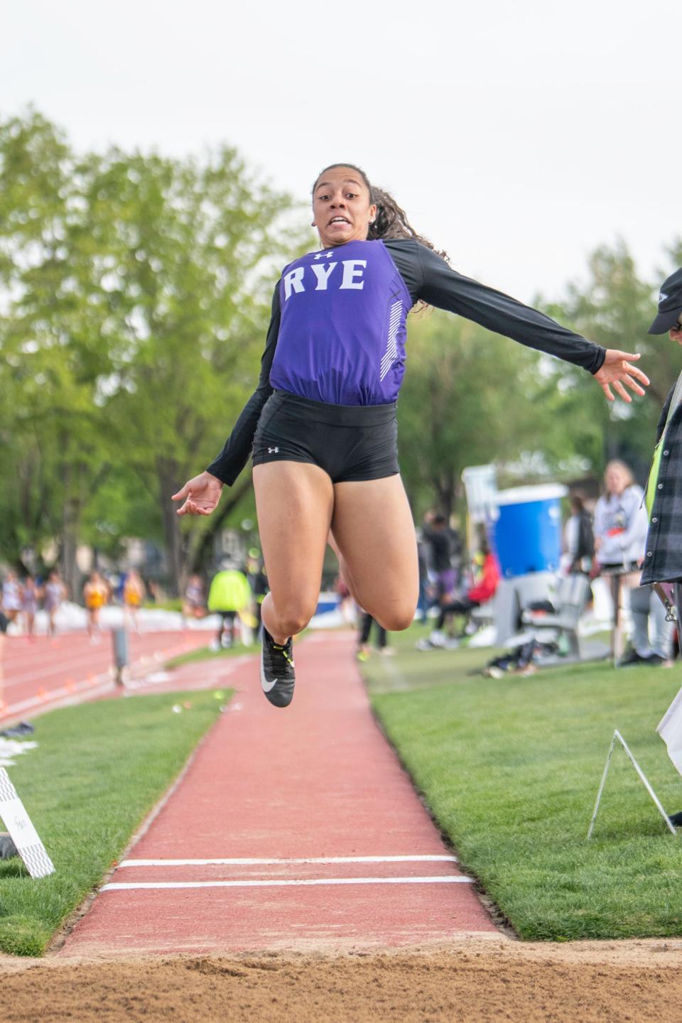 Rye's Jordan Holgerson takes flight in the Class 2A long jump final during the CHSSA state track and field meet on Saturday, May 21, 2022 at Jeffco Stadium.