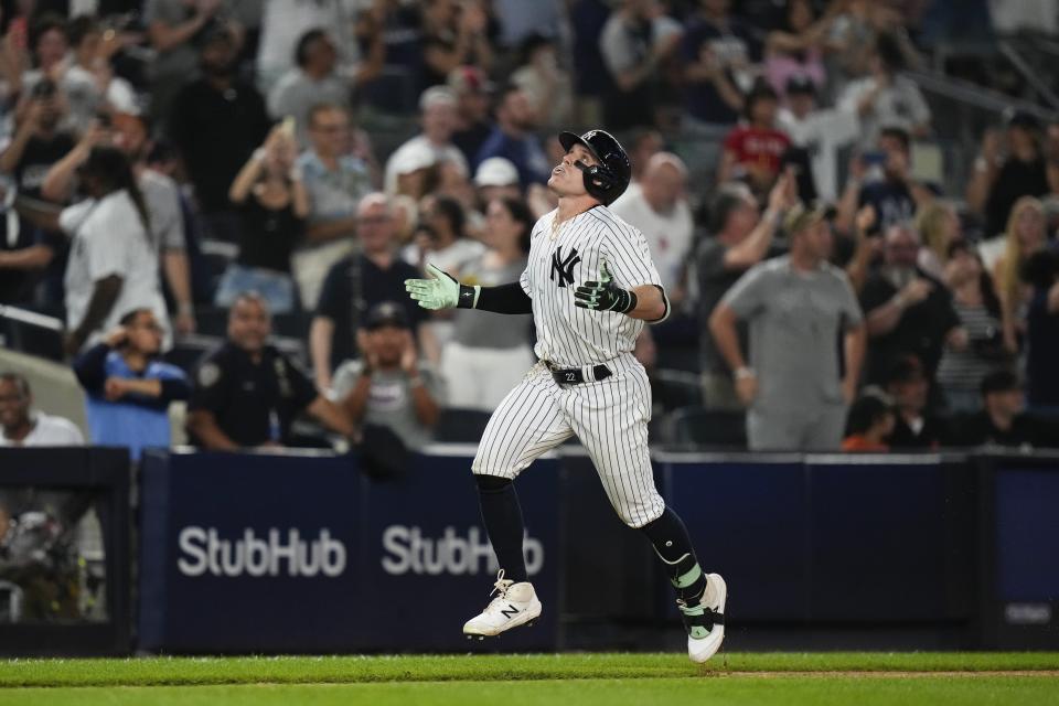 New York Yankees' Harrison Bader gestures as he runs the bases after hitting a three-run home run during the eighth inning of a baseball game against the Baltimore Orioles, Monday, July 3, 2023, in New York. (AP Photo/Frank Franklin II)