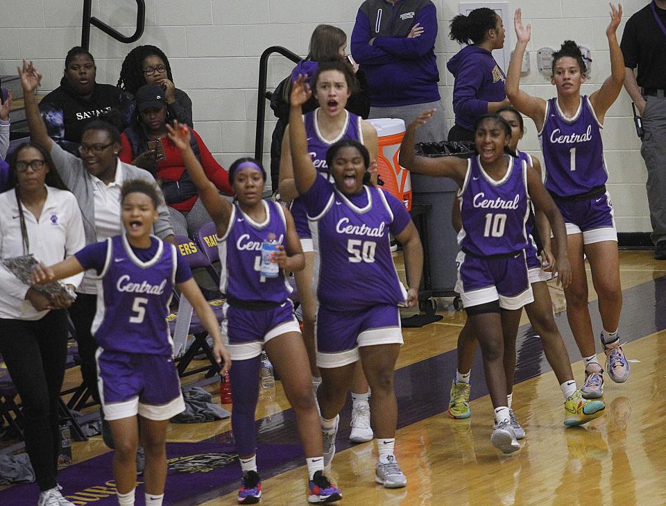 Pickerington Central celebrates after hitting a shot at the first-quarter buzzer Nov. 29 at Reynoldsburg. The Tigers beat the defending Division I state champion Raiders 67-36.