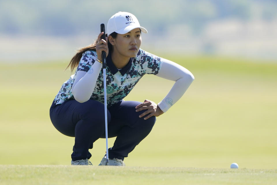 Xiyu Janet Lin, of China, lines up a putt on the seventh green during the final round of the LPGA The Ascendant golf tournament in The Colony, Texas, Sunday, Oct. 2, 2022. (AP Photo/LM Otero)