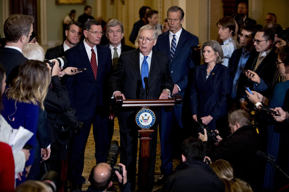 Senate Majority Leader Mitch McConnell, R-Ky., accompanied by from left, Sen. Todd Young, R-Ind., Sen. John Barrasso, R-Wyo., Sen. Roy Blunt, R-Mo., Senate Majority Whip Sen. John Thune, R-S.D., and Sen. Joni Ernst, R-Iowa, speaks to reporters during a news conference, Tuesday, Dec. 10, 2019, on Capitol Hill in Washington. (AP Photo/Andrew Harnik)