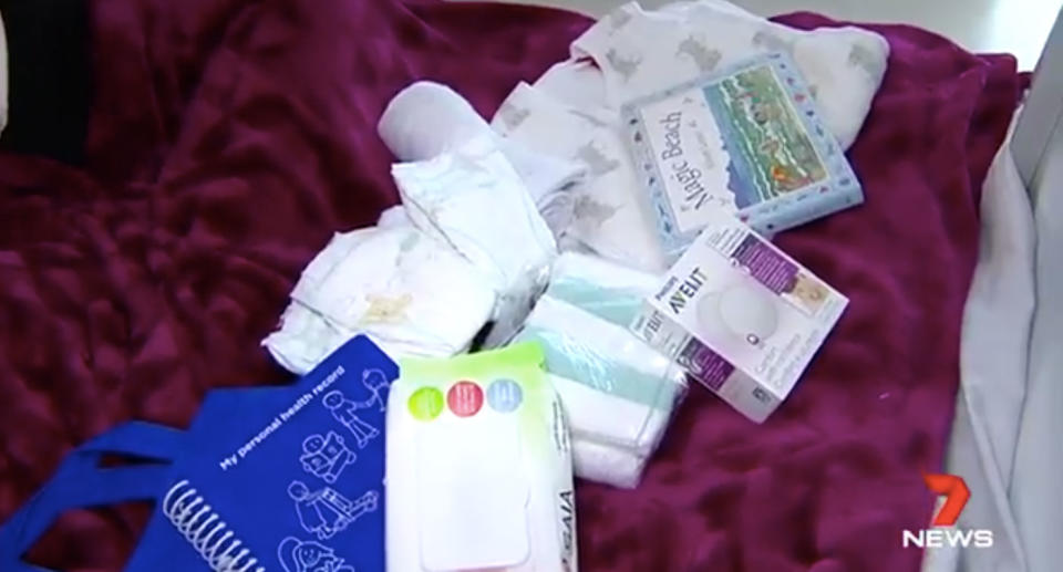 The package includes nappies, baby wipes and even a reading book. Source: 7News