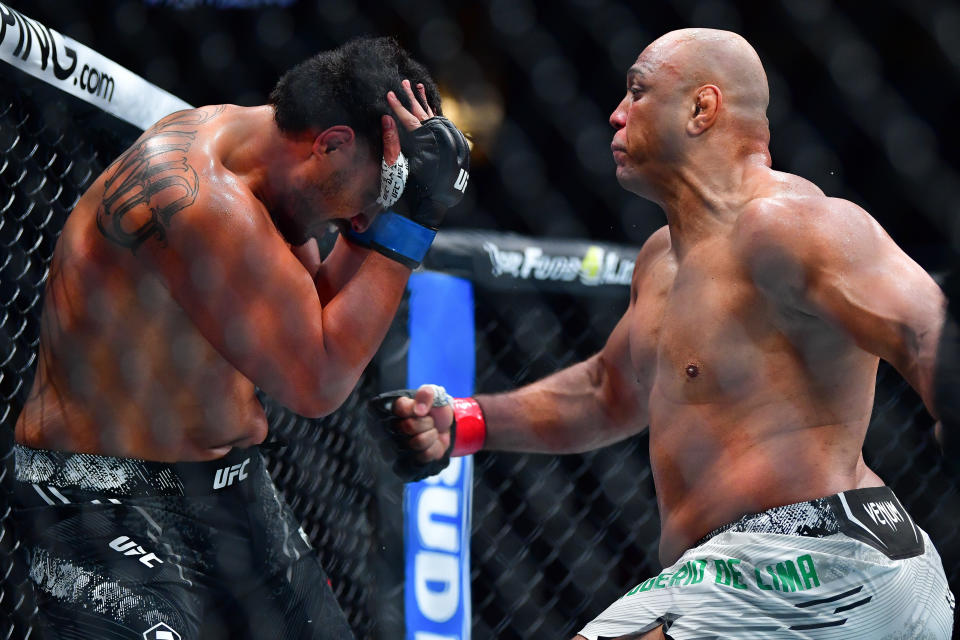 Feb 17, 2024; Anaheim, California, USA; Marcos Rogerio de Lima moves in with a hit against Junior Tafa during UFC 298 at Honda Center. Mandatory Credit: Gary A. Vasquez-USA TODAY Sports