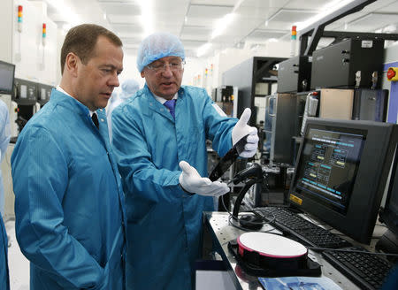 FILE PHOTO: Russian Prime Minister Dmitry Medvedev visits a plant of Russian microchip company Angstrem-T in Zelenograd near Moscow, Russia August 3, 2016. Sputnik/Dmitry Astakhov/Pool via REUTERS