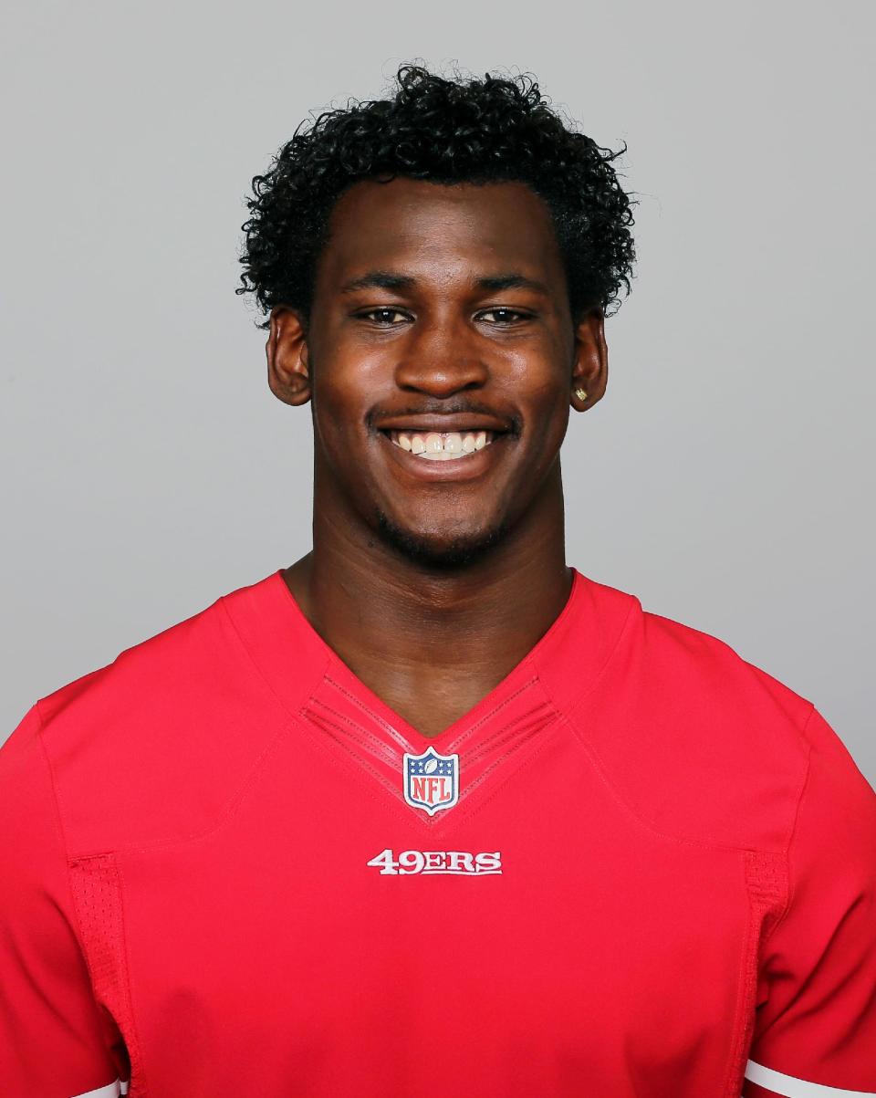 In this 2013 photo, San Francisco 49ers' Aldon Smith poses for a photo, location not known. Smith has been arrested at Los Angeles International Airport after authorities said he became belligerent during a security screening and threatened that he had a bomb. LAPD Sgt. Michael Fox said Smith was booked Sunday afternoon, April 13, 2014. (AP Photo)