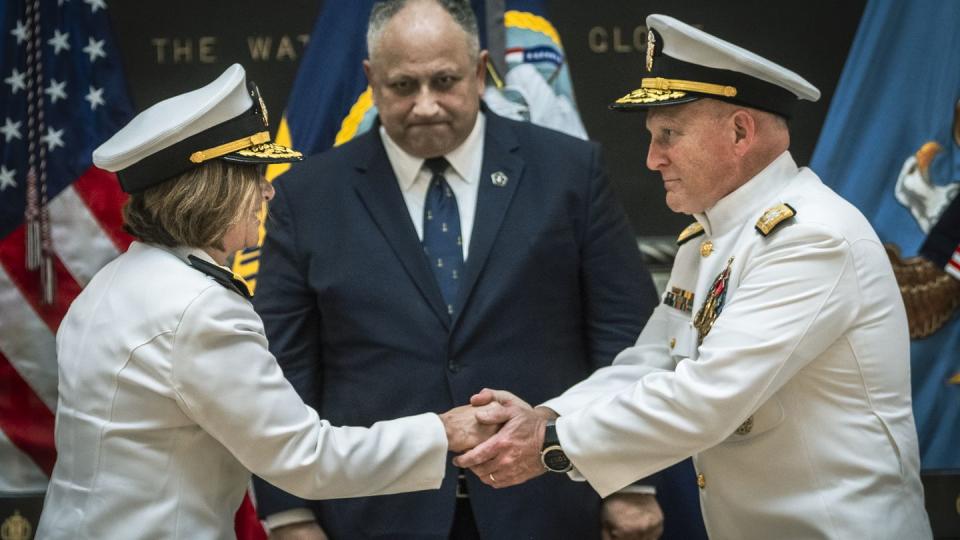 Chief of Naval Operations Adm. Michael Gilday, right, relinquishes command to Vice Chief of Naval Operations Adm. Lisa Franchetti, left, as Navy Secretary Carlos Del Toro watches. (Chad McNeeley/Defense Department)