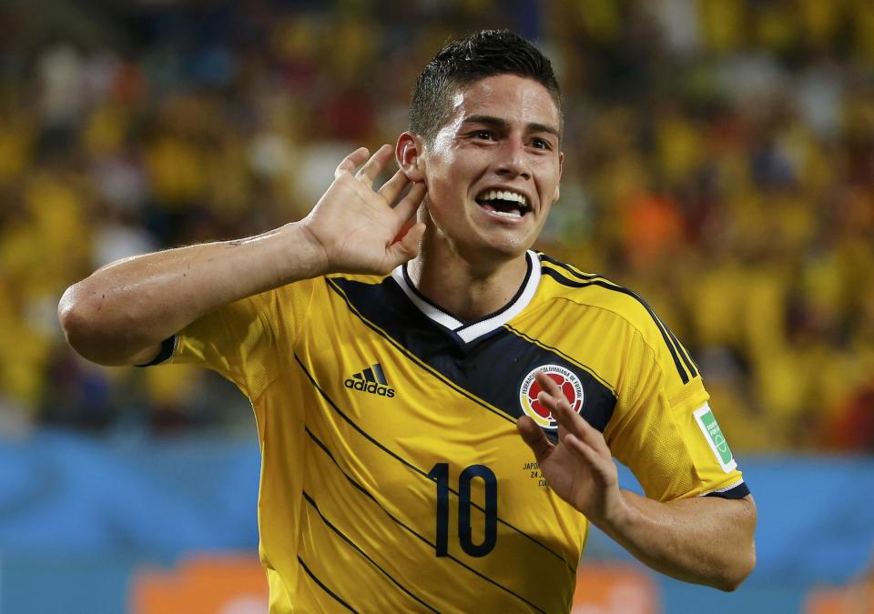 Colombia's James Rodriguez celebrates after scoring a goal during the 2014 World Cup Group C soccer match between Japan and Colombia at the Pantanal arena in Cuiaba June 24, 2014. REUTERS/Eric Gaillard