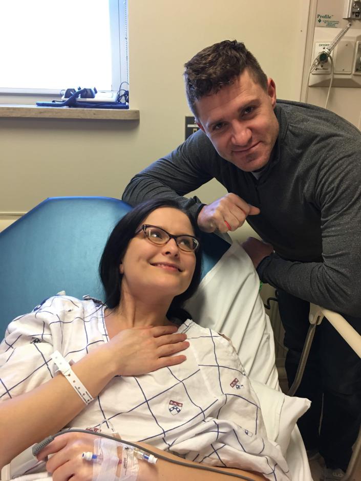 Chelsea Jovanovich waits with her husband, Jake, before undergoing uterine transplant surgery through Penn Medicine&#39;s Uterus Transplantation for Uterine Factor Infertility trial program at the Hospital of the University of Pennsylvania in Philadelphia on Feb. 21, 2020. The transplant would give Jovanovich, who had been born without a fully functional uterus, a chance to carry her own children.