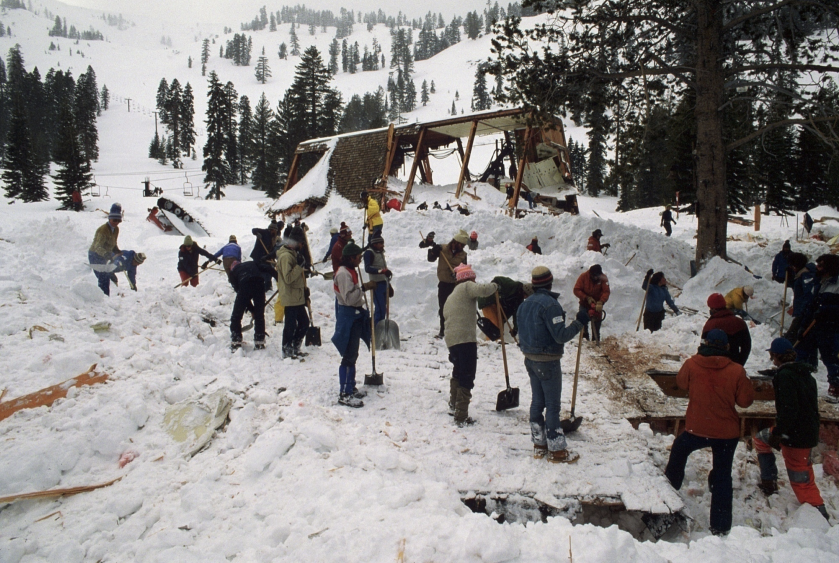 Rescuers dig in the snow after the 1982 Alpine Meadows avalanche - Credit: Greenwich Entertainment