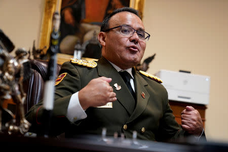 FILE PHOTO: Venezuelan Colonel Jose Luis Silva, Venezuela’s Military Attache at its Washington embassy to the United States, is interviewed by Reuters after announcing that he is defecting from the government of President Nicolas Maduro in Washington, U.S., January 26, 2019. REUTERS/Joshua Roberts/File Photo