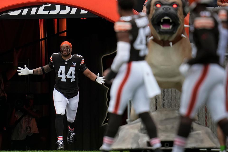 Cleveland Browns linebacker Sione Takitaki (44) runs onto the field before a game against the Tennessee Titans on Sept. 24 in Cleveland.