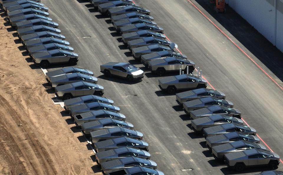 Cybertrucks are lined up at Tesla Giga Texas on Tuesday April 2, 2024.