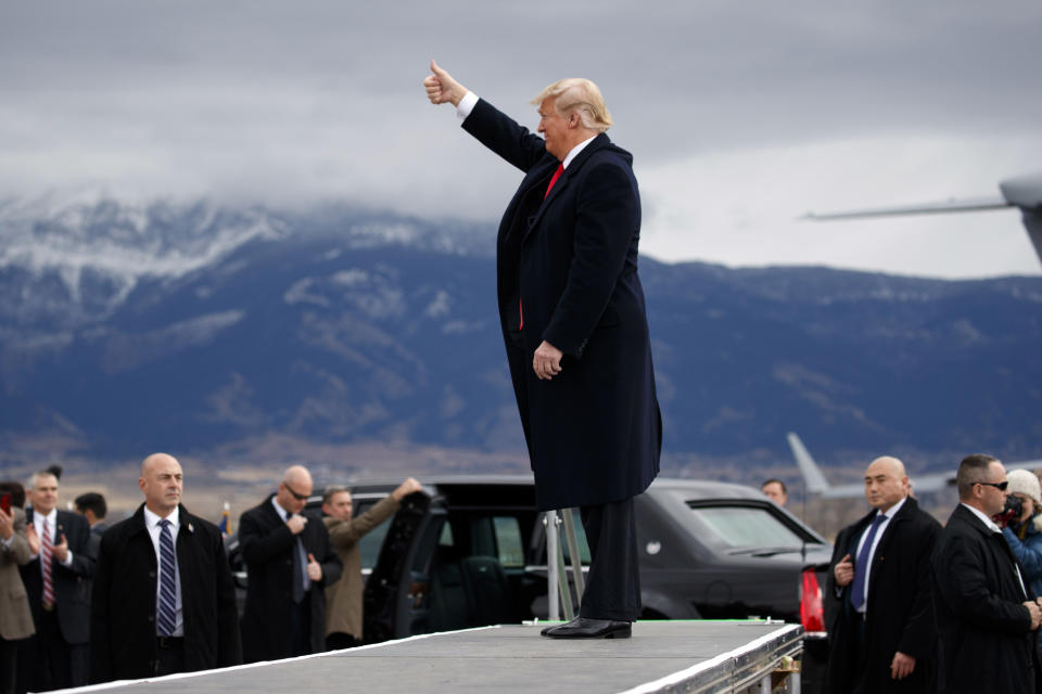 FILE - In this Nov. 3, 2018, file photo President Donald Trump arrives for a campaign rally at Bozeman Yellowstone International Airport in Belgrade, Mont. If approved by Congress and signed by Trump, the Great American Outdoors Act would be the most significant conservation legislation enacted in nearly half a century. The bill, set for a Senate vote this coming week, would spend about $2.8 billion per year on conservation, outdoor recreation and park maintenance. (AP Photo/Evan Vucci, File)