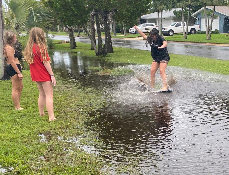 DeSoto Parkway was completely flooded early, but by late afternoon the water had receeded, and these young women took advanage of the flooded drainage ditch. Brevard started experiencing effects of Hurricane Ian Wednesday morning. Brevard started experiencing effects of Hurricane Ian Wednesday morning. 
