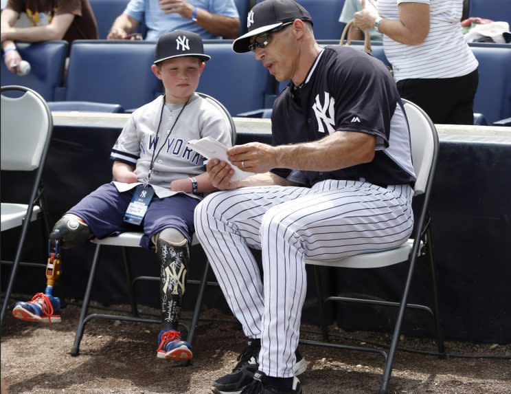 Landis Sims tossed a perfect first pitch Sunday. (AP Photo)