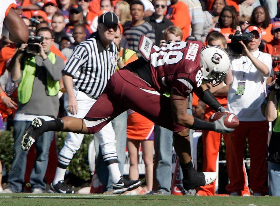 From Nov. 28, 2009: South Carolina tight end Weslye Saunders stretches into the end zone for a touchdown against Clemson.