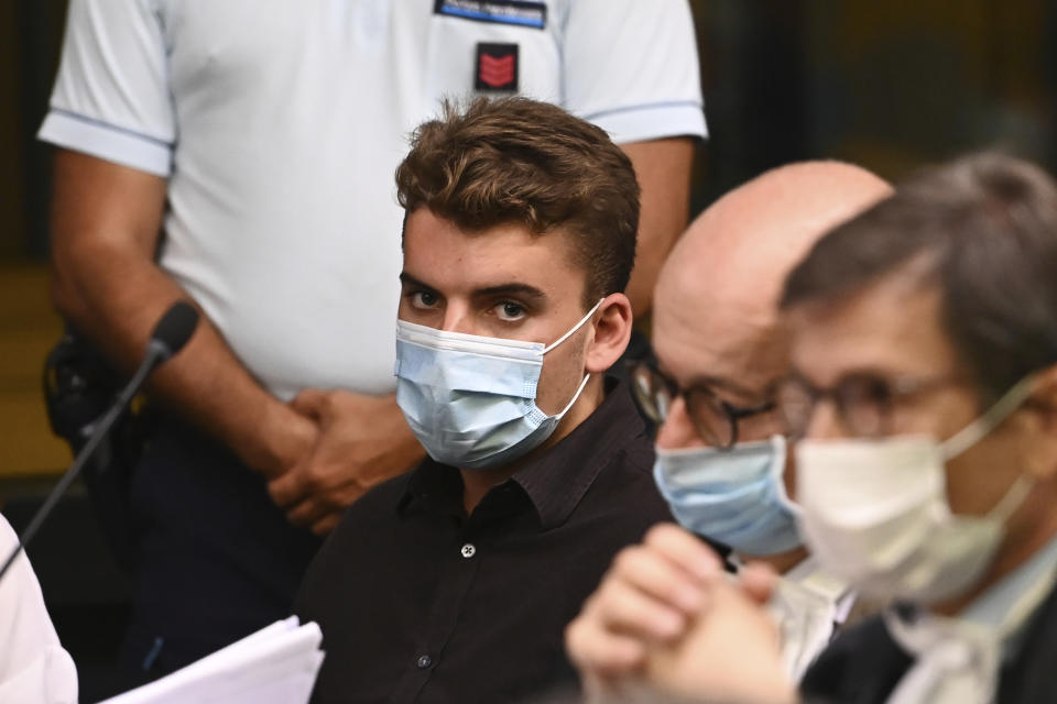 Gabriel Natale Hjorth, from the United States, center, arrives in the courtroom where he is standing trial for the killing of Italian Carabinieri police officer Mario Cerciello Rega, in Rome, Wednesday, July 22, 2020. Two tourists from California are accused of murdering Cerciello during their summer vacation in Italy in July 2019. (Andreas Solaro/Pool via AP)