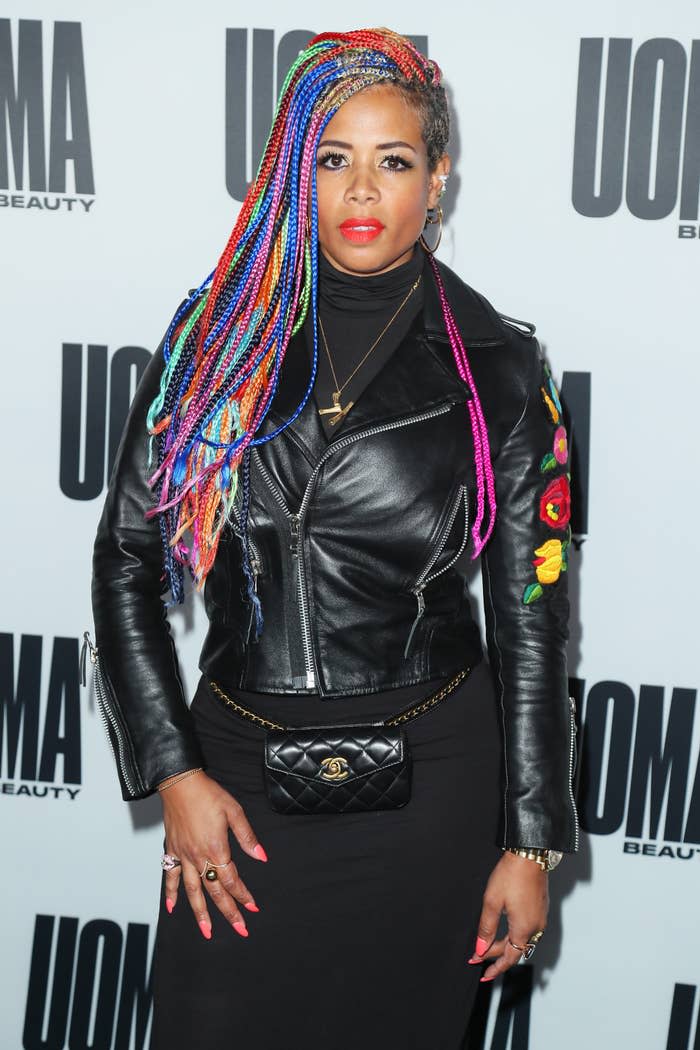 A closeup of Kelis on the red carpet rocking multi-colored braids