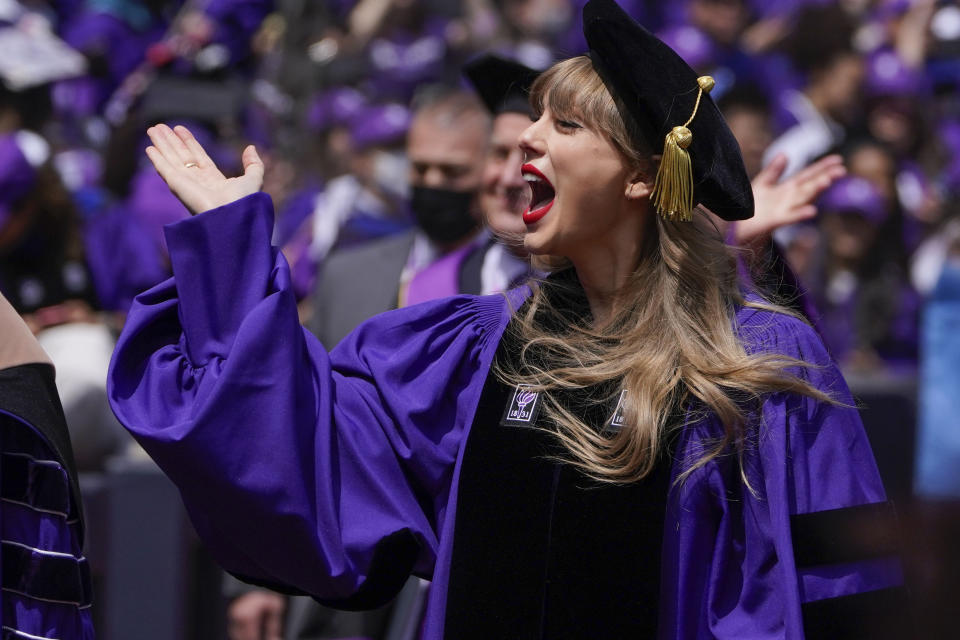 Taylor Swift participates in a graduation ceremony for New York University at Yankee Stadium in New York, Wednesday, May 18, 2022. (AP Photo/Seth Wenig)