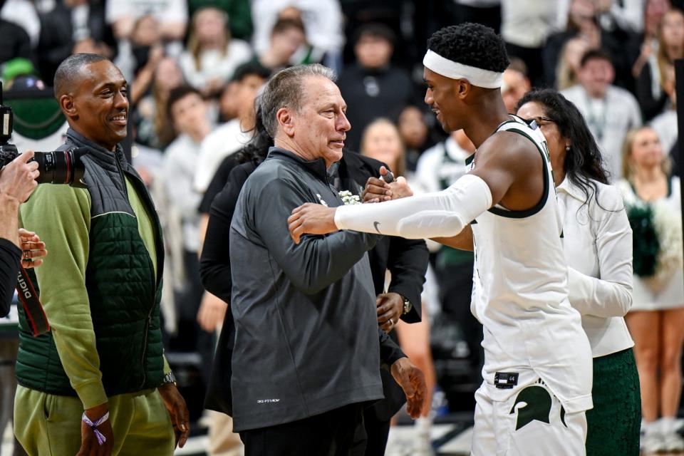 Michigan State's head coach Tom Izzo, left, hugs Tyson Walker during the senior night celebration after the game against Northwestern on Wednesday, March 6, 2024, at the Breslin Center in East Lansing.