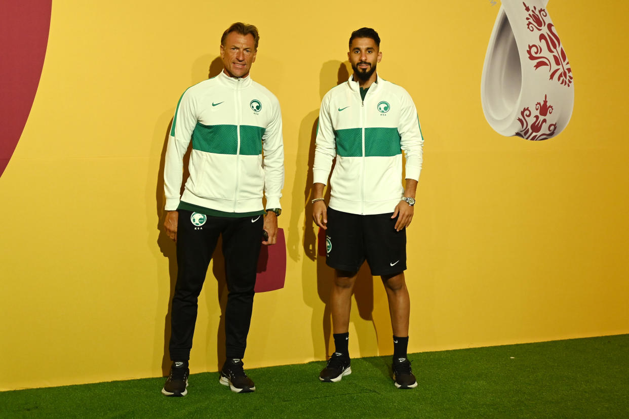 DOHA, QATAR - NOVEMBER 25: Herve Renard, Head Coach of Saudi Arabia, and Saleh Al-Shehri of Saudi Arabia pose for a photo during the Saudi Arabia Press Conference at the Main Media Center on November 25, 2022 in Doha, Qatar. (Photo by David Ramos - FIFA/FIFA via Getty Images)