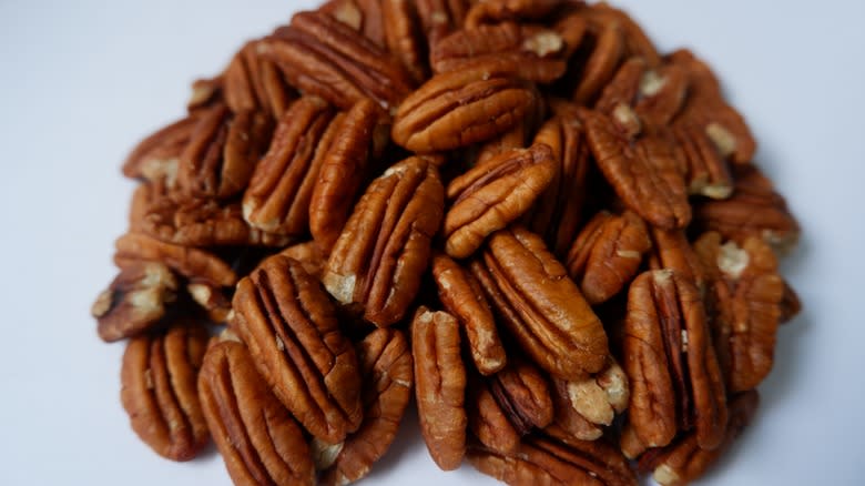 A pile of whole pecans