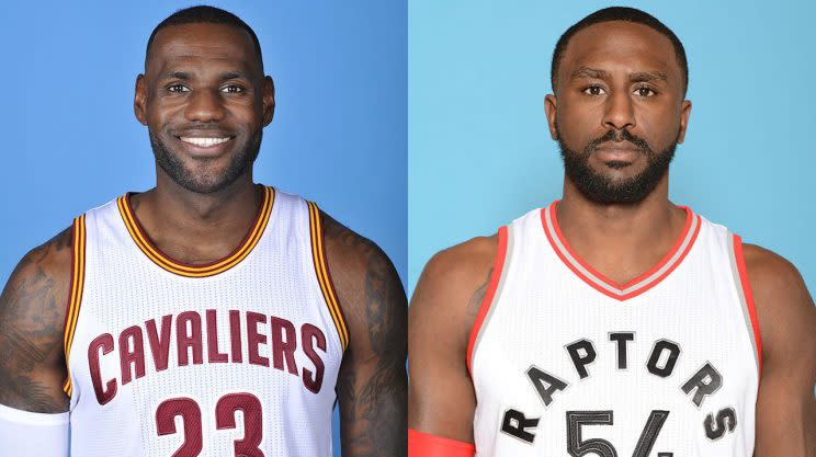 LeBron James and Patrick Patterson aren't exactly twins. (Getty Images)