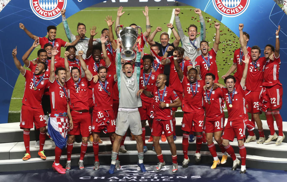 Bayern players celebrate after winning the Champions League final soccer match between Paris Saint-Germain and Bayern Munich at the Luz stadium in Lisbon, Portugal, Sunday, Aug. 23, 2020. (Miguel A. Lopes/Pool via AP)