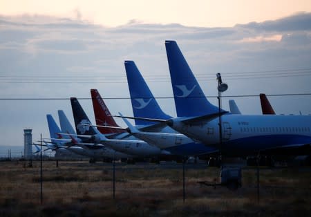 FILE PHOTO - The tails of Boeing 737 MAX aircraft are seen parked at Boeing facilities at the Grant County International Airport in Moses Lake