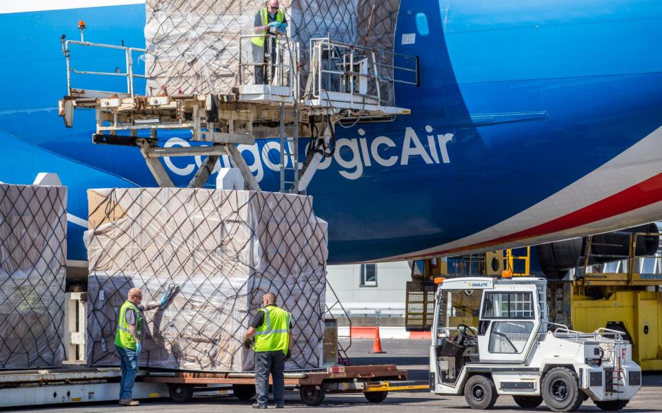 CargoLogicAir flight CLU 5694 lands at Prestwick Airport on Monday this week with a consignment of NHS medical supplies and PPE from China - PA