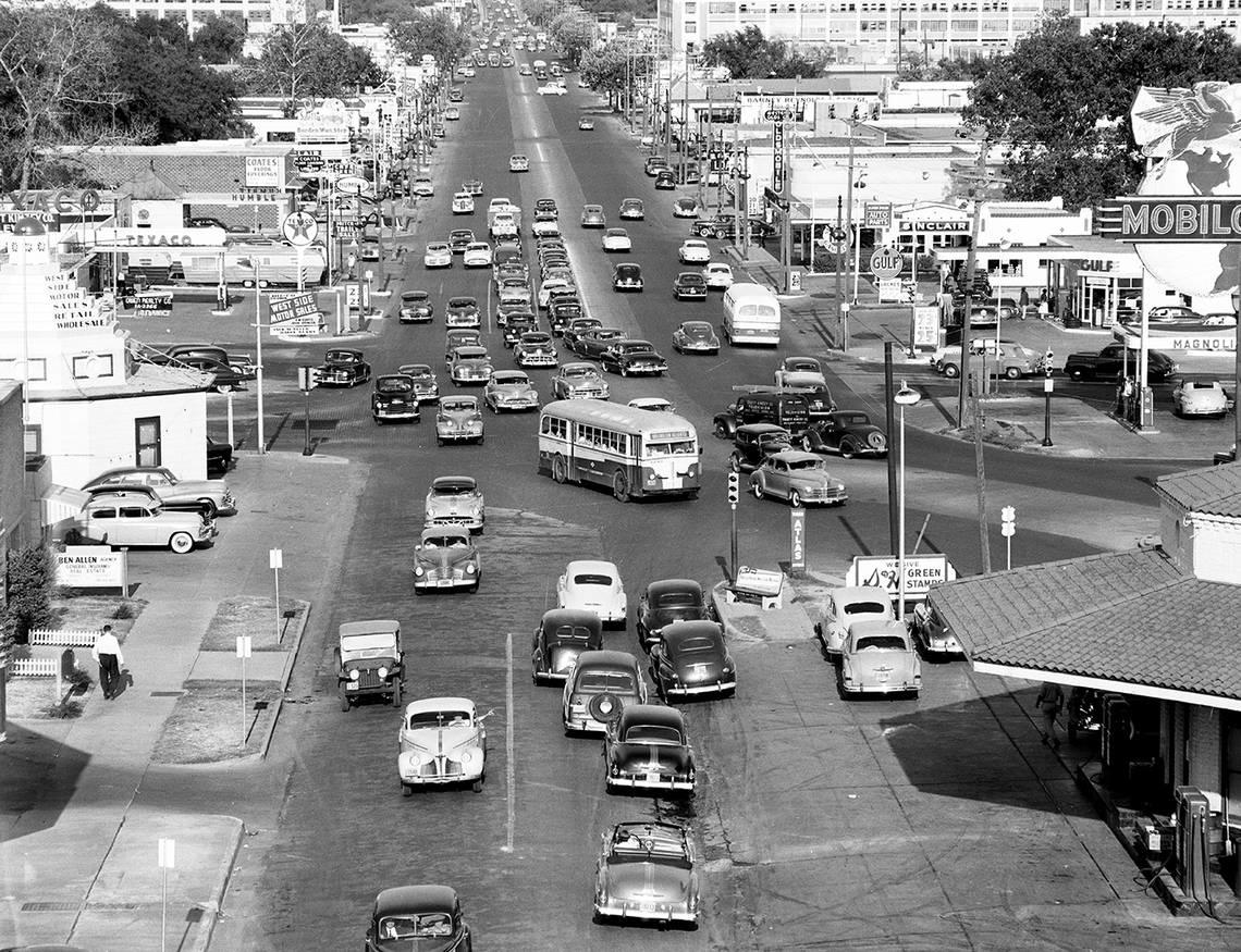 Aug. 17, 1951: “The traffic scene at the intersection of West Seventh, Camp Bowie Boulevard and University Drive is typical of daily jams along the principal routes between Arlington Heights and the downtown district. The proposed city improvements bond issue sets up funds for two new arterial thoroughfares into Arlington Heights that will go a long way toward relieving the rush-hour congestion.”