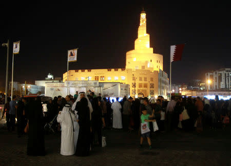 FILE PHOTO: People are seen at Souq Waqif market in Doha, Qatar, June 9, 2017. REUTERS/Naseem Zeitoon/File photo