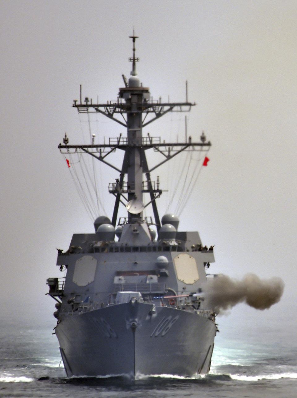 In this April 25, 2017 photo provided by South Korean Defense Ministry, the destroyer USS Wayne E. Meyer fires during a joint exercises between the United States and South Korea in South Korea's West Sea. The Pentagon and South Korea are canceling another major military exercise this year, citing a push for diplomatic progress with North Korea. (South Korean Defense Ministry via AP)