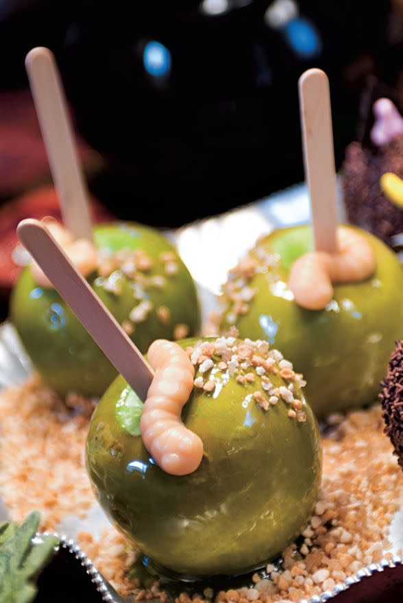 <p>Get ready to sink your teeth into these candy apples decorated with gummy worms and pralines. </p><p><a href="https://www.womansday.com/food-recipes/food-drinks/a28858378/candy-apples-with-gummy-worms-recipe/" rel="nofollow noopener" target="_blank" data-ylk="slk:Get the Candy Apples with Gummy Worms recipe.;elm:context_link;itc:0;sec:content-canvas" class="link "><strong><em>Get the Candy Apples with Gummy Worms recipe. </em></strong> </a></p>