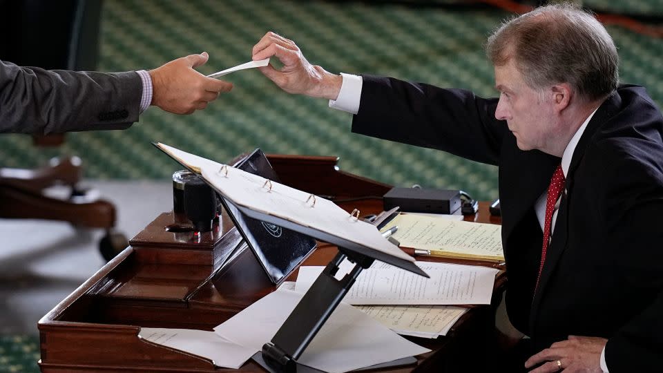 Texas state Sen. Brian Birdwell acting as a juror votes on the articles of impeachment against suspended Texas Attorney General Ken Paxton in the Senate Chamber at the Texas Capitol, Saturday, Sept. 16, 2023, in Austin, Texas. (AP Photo/Eric Gay) - Eric Gay/AP