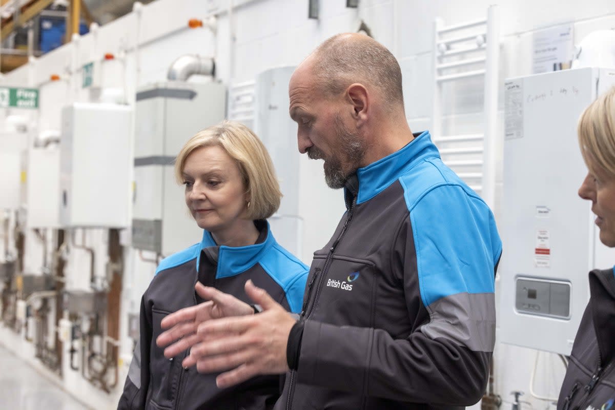 Centrica boss Chris O’Shea, pictured last year with then-prime minister Liz Truss, was handed a £4.5m pay package after the business saw its profits soar (PA Wire)