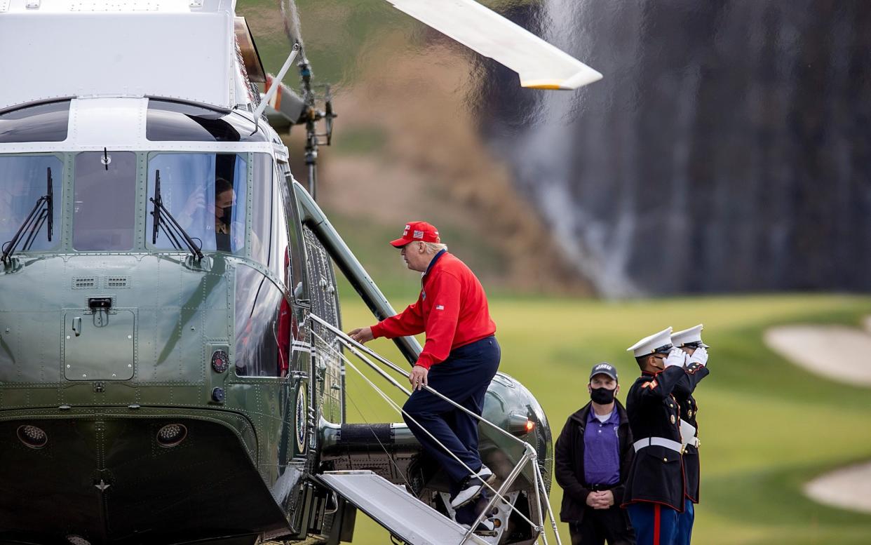 President Donald Trump boards Marine One after golfing at Trump National Golf Club in Sterling, Virginia - Tasos Katopodis/Getty Images