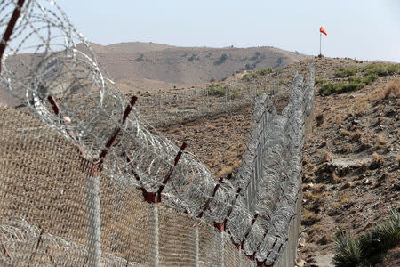 A view of the border fence outside the Kitton outpost on the border with Afghanistan in North Waziristan, Pakistan October 18, 2017. REUTERS/Caren Firouz