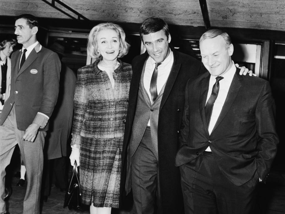 The composer with Marlene Dietrich (left) in 1964 (Getty)