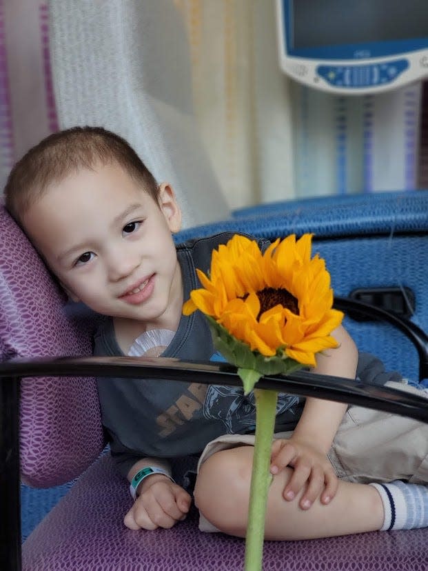 Elliott Slocum, 6, recently finished chemotherapy after being diagnosed with blood cancer. This photo was taken at the hospital in 2019.