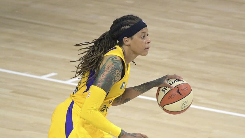 Los Angeles Sparks guard Seimone Augustus (33) brings the ball up the court during the first half of a WNBA basketball game against the Phoenix Mercury, Saturday, July 25, 2020, in Bradenton, Fla. (AP Photo/Phelan M. Ebenhack)