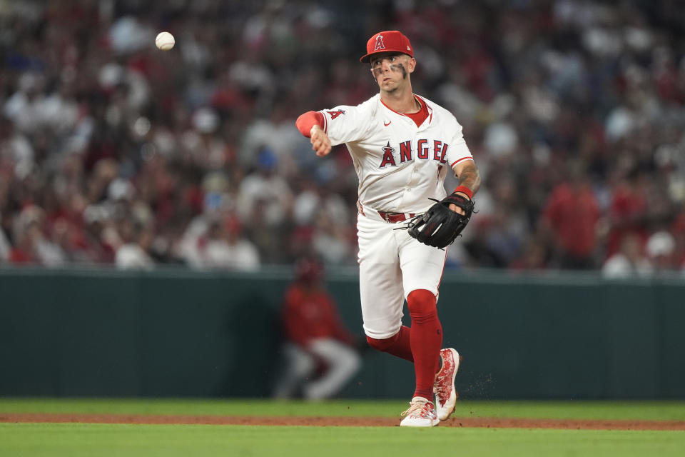 Los Angeles Angels shortstop Zach Neto throws out Detroit Tigers' Matt Vierling at first during the eighth inning of a baseball game Friday, June 28, 2024, in Anaheim, Calif. (AP Photo/Ryan Sun)