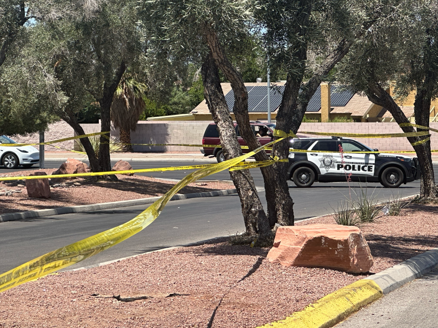 Police investigate scene of a double-shooting in southeast Las Vegas Tuesday. (KLAS/Joshua Peguero)